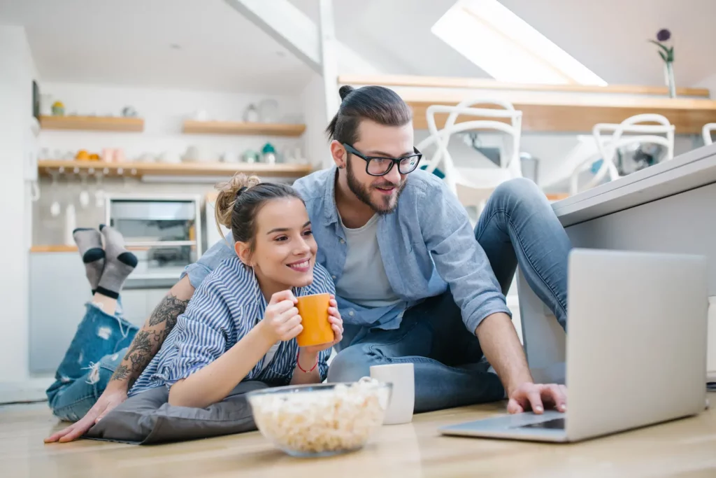 couple watching laptop